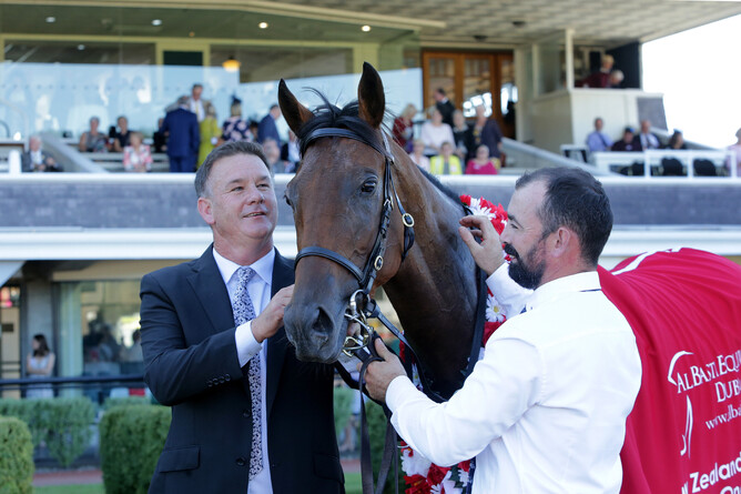 Trainers Shaune Ritchie and Colm Murray pictured with Jennifer Eccles after her win in the Gr.1 New Zealand Oaks (2400m). Photo: Trish Dunell