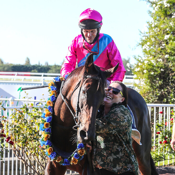 Smiles all round as co-trainer Krystal Williams-Tuhoro leads Irish Girl and Terry Moseley back to the Riccarton winner’s stall after their victory in the Valachi Downs South Island Breeders’ Stakes.