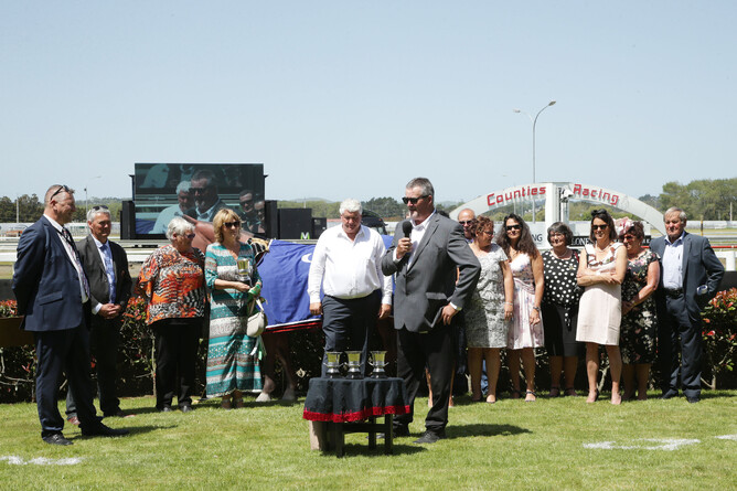 Clyde (far right) and Pat (fourth from right) Buckingham at the trophy presentation for the Gr.2 Auckland Thoroughbred Breeders' Stakes - Trish Dunell