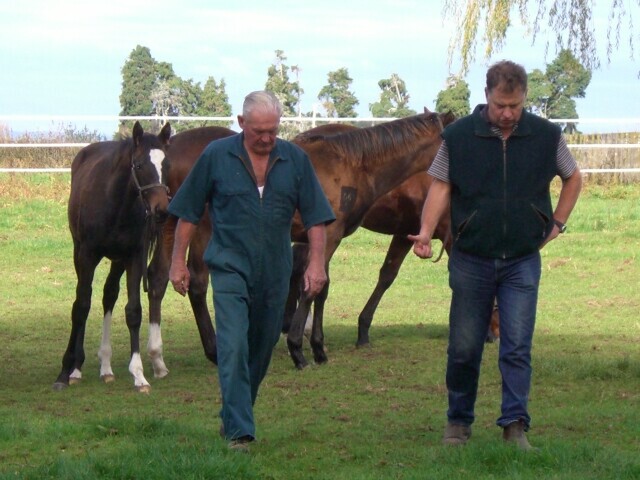 Colin and John Thompson doing the rounds when Colin was a practicing vet. - Photo: Supplied
