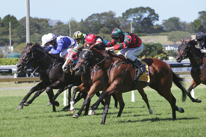 Rocket Spade (outer) produces a powerful late run to take victory in the Gr.2 AJC Avondale Guineas (2100m) at Ellerslie Photo Credit: Trish Dunell