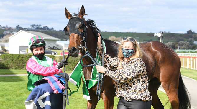 Trainer Chrissy Bambry (right) and jockey Sarah McNab celebrate their success with Bellacontte in the Listed O’Learys Filles Stakes (1200m) at Wanganui Photo Credit: Race Images - Grant Matthew