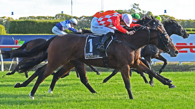 Apostrophe sprints to victory in the closing stages over Saint Alice in the Gr.2 Travis Stakes (2000m) at Te Rapa on Saturday.  - Photo: Kenton Wright (Race Images)