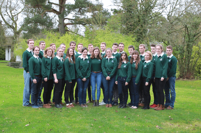Cameron Ring (back row 6th from left) and the INS Scholarship Students