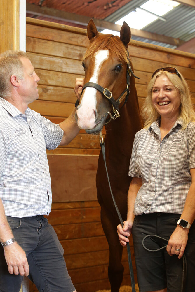 Cam and Eva Heron with lot 664, the Per Incanto colt, purchased by Robin Tai for $155,000. Photo: Trish Dunell