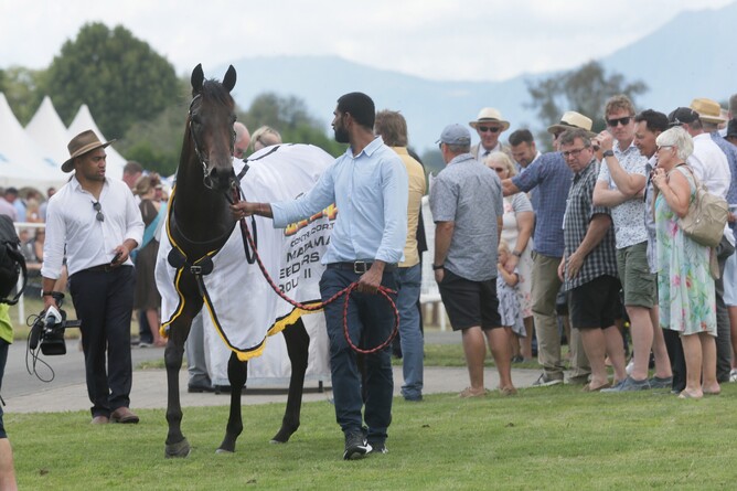 Bonny Lass and some of her connections following her Group Two win. - Photo: Trish Dunell