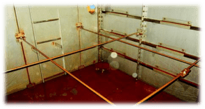 before pictures of a rusted tank interior
