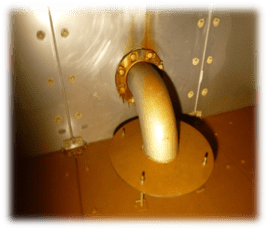 the rusted interior of liquid storage tank