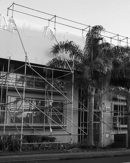 Scaffolding partially shrink wrapped