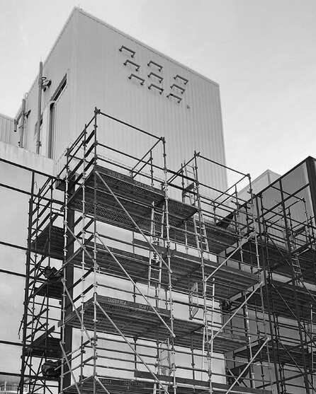 Scaffolding against a commercial building