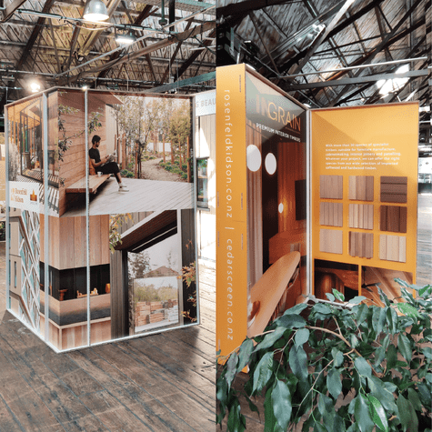 two views of event display stands and panels for Rosenfeld Kidson timbers used at an Archipro event.