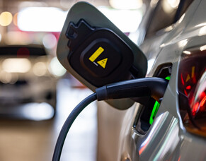 Balancing the Grid: The Role of Charge Modulation in EV Chargers
