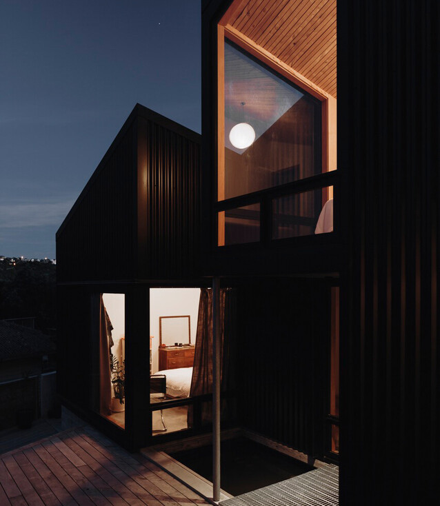 Internally lit Architectural home at night