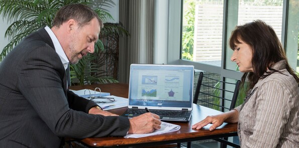 Salesman negotiating with customer