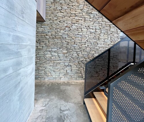 Ardent Building Developments. Hamilton, Waikato. NZ. Image of new home build. Stairs and stone wall