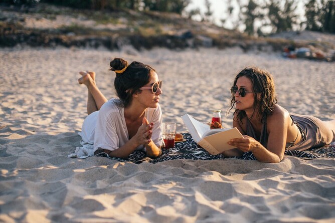 Girls relaxing on the beach traveling in South East Asia