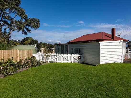 View of the north side of the Kūaotunu Hall, as seen from Irishtown Rd