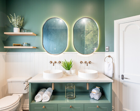 Image of heritage home bathroom in deep green and white renovated and restored by Whitechurch Construction, Waikato residential builders.