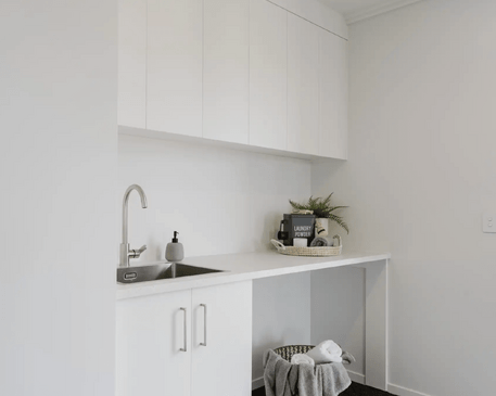 Image of modern white laundry room in Collinson Street, Pirongia new home, by Waikato residential builders Whitechurch Construction Limited.