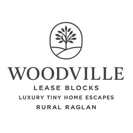 Image of Woodville logo, for luxury tiny home escapes in rural raglan.