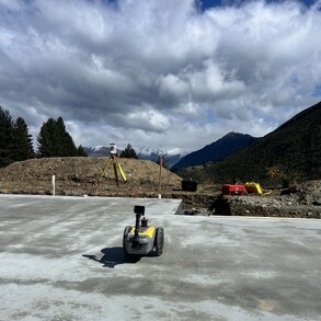 The PLS siteprint robot at work marking a building slab on site.
