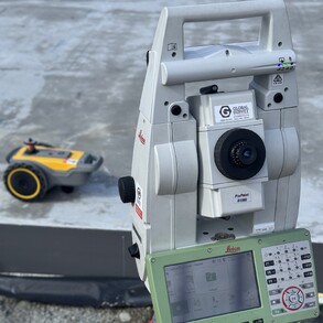 The PLS robotic total station and site print robot together.