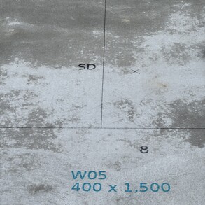 Printed marks on a concrete slab by PLS.