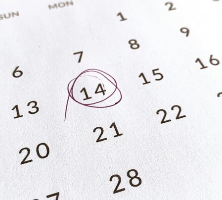 A calendar with the date circled.