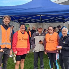 Volunteers in high vis at a Parkrun Event