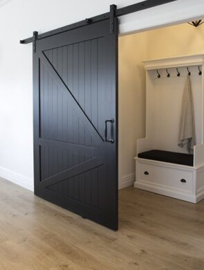 Are barn doors still in style? Interior designers weigh in on the well-loved rustic feature