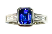 Emerald cut Ceylonese Sapphire & baguette diamonds set in Platinum